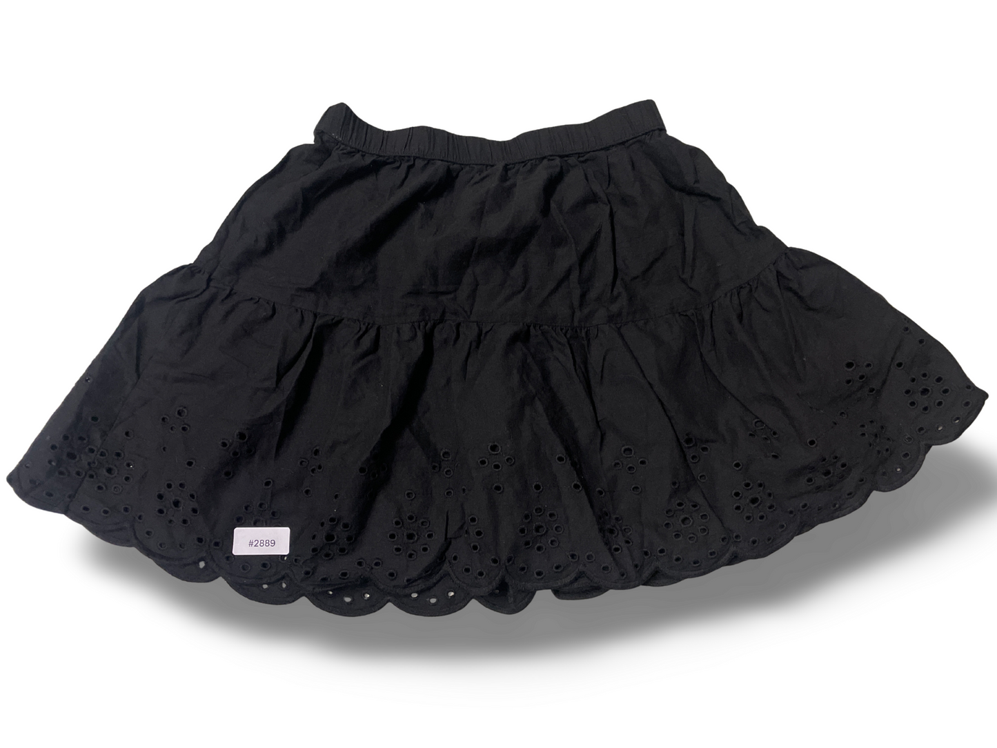 Schwarzer Stufenrock mit Lochstickerei - Gr. 110
