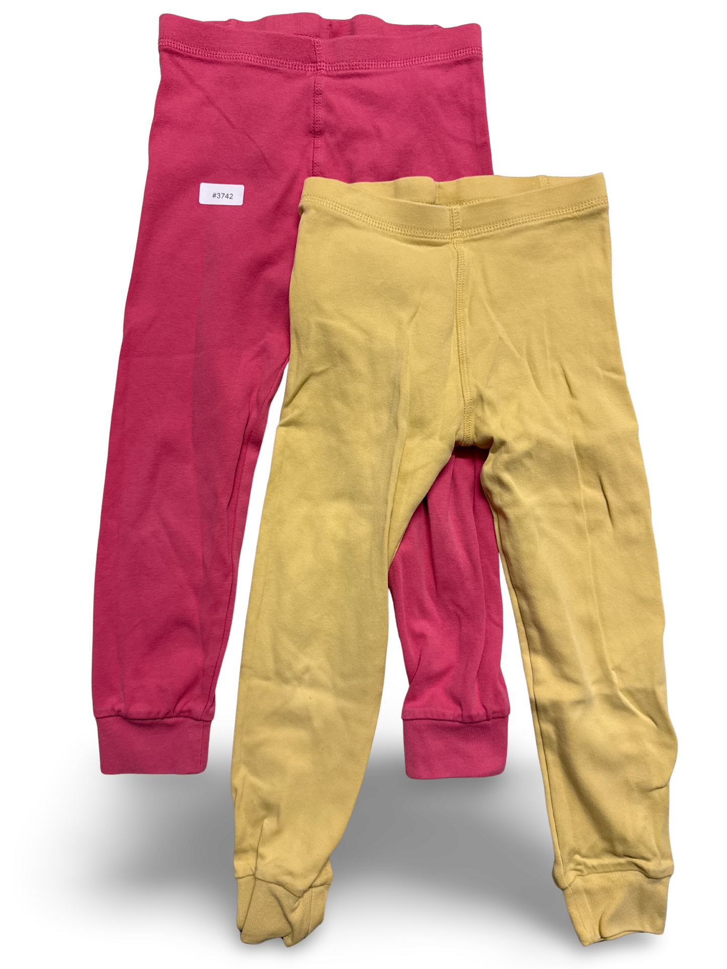 Gelbe Strumpfhose und pinke Leggings - Gr. 116