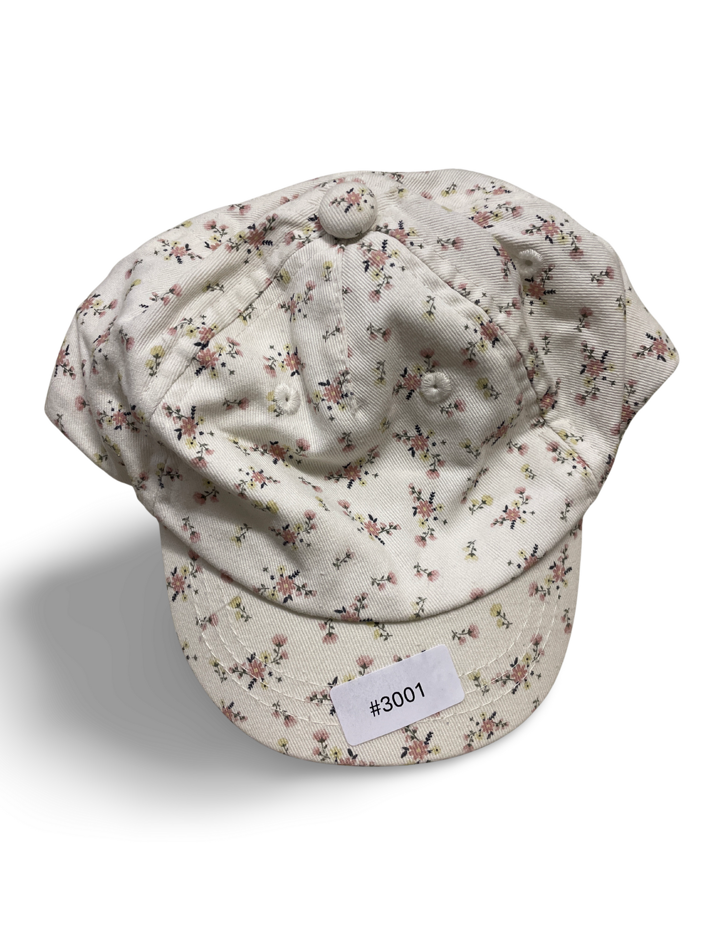 Weisse Schirmmütze mit Blumenmuster - Gr. 74