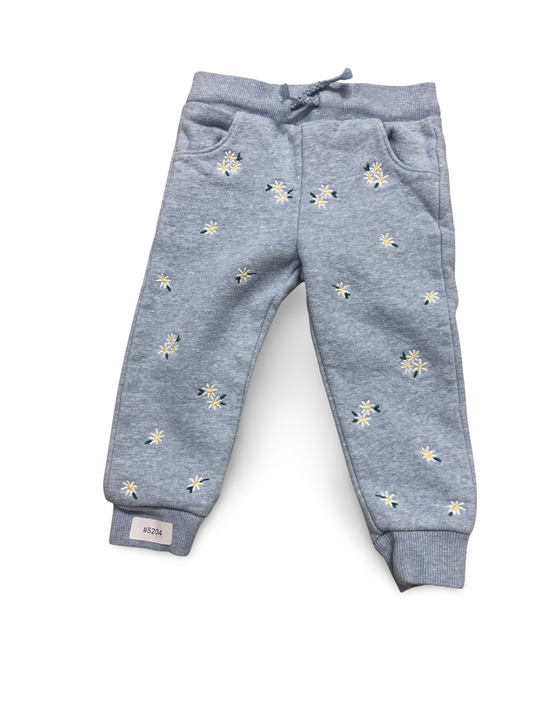 Hellblaue Jogginghose mit Blumenstickerei - Gr. 86