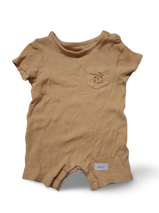 Beiger Strampler mit Waffelstruktur und Löwenmotiv - Gr. 74